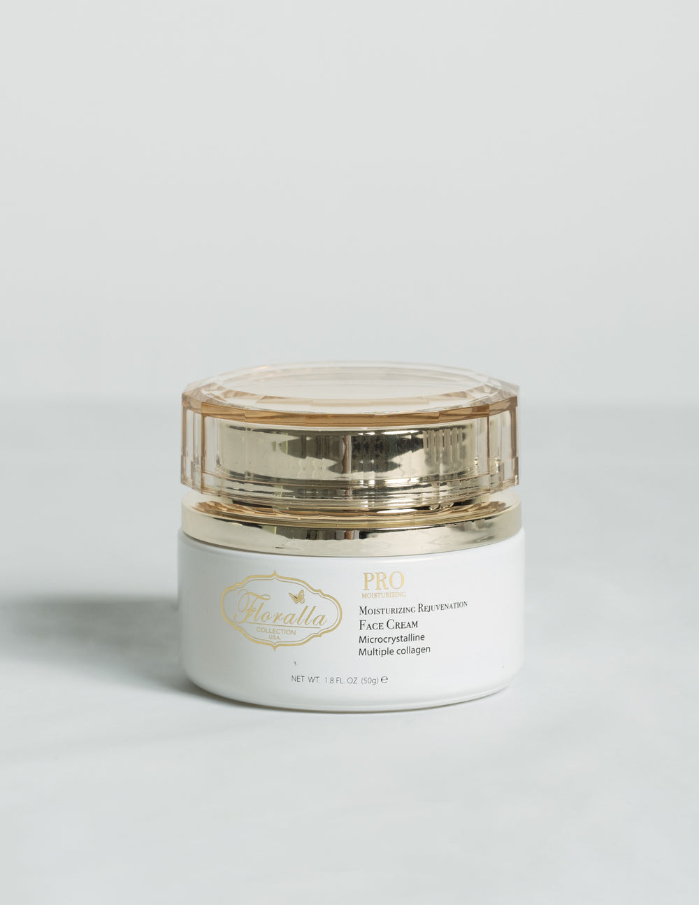 Floralla Pro Moisturizing Rejuvenating Face Cream in a gold-rimmed jar