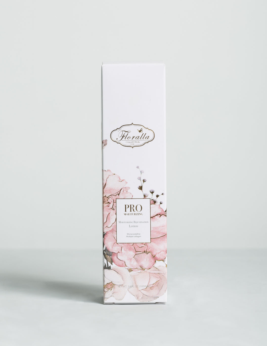 Floralla Pro Moisturizing Rejuvenation Lotion, in white cardboard box packagin with pink floral designs and gold accents.