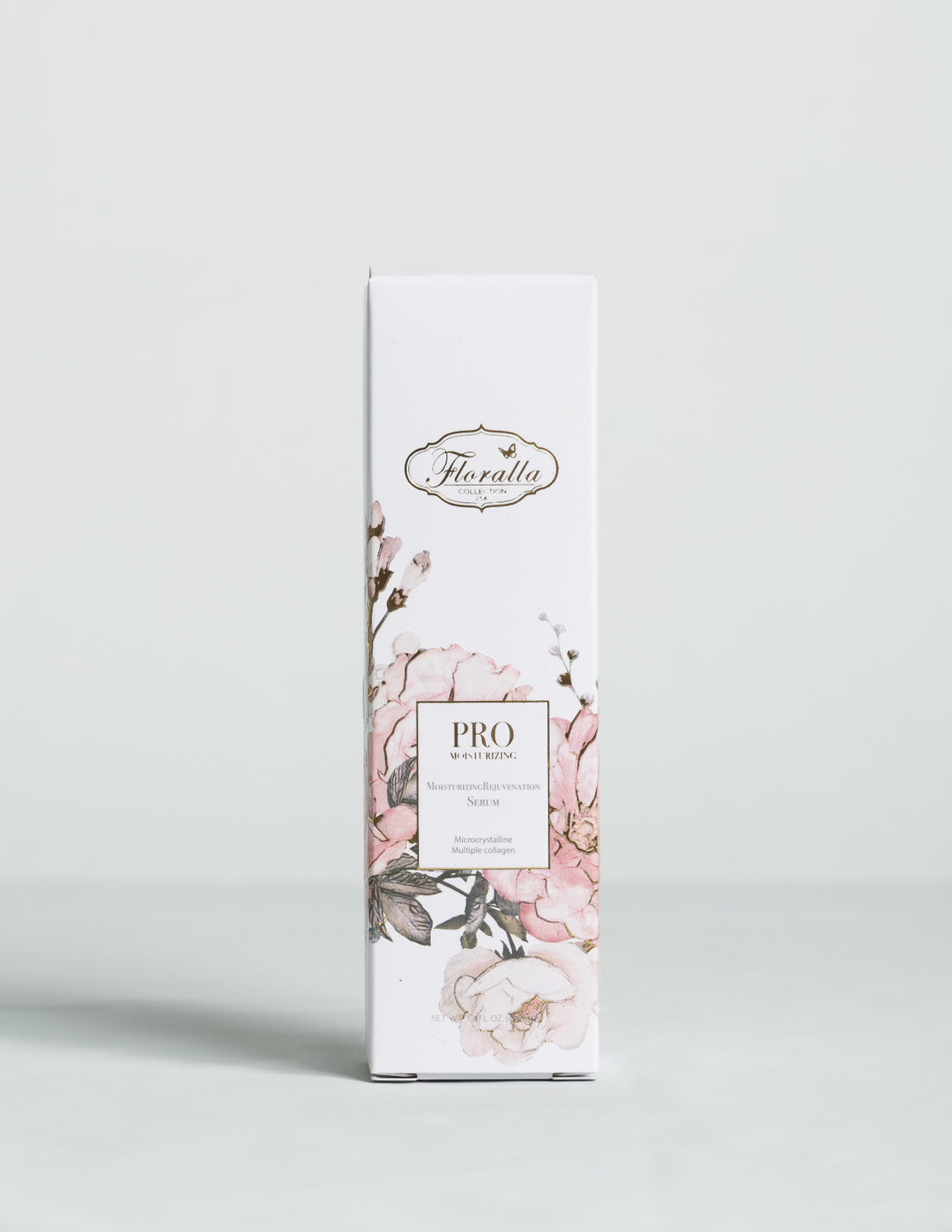 Floralla Pro Moisturizing Rejuvenation Serum, in white cardboard box with pink floral designs and gold accents.